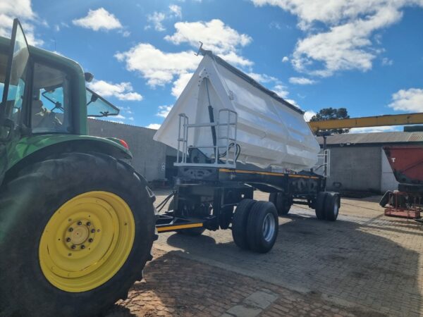 Farm-release tipper